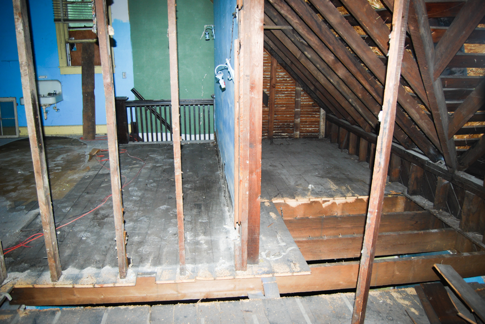 Some of the floor removed to help us layout the upstairs and downstairs bathrooms.