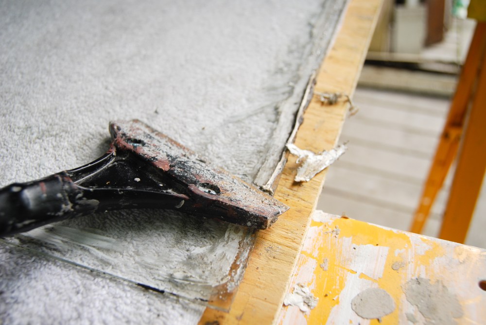 Scraping and cleaning the glass