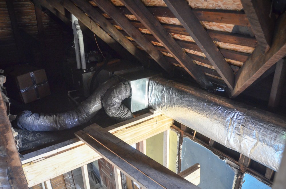 The "furnace room" is located in an unused space behind the master bedroom.