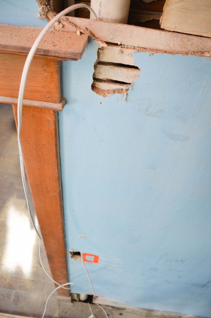 A hole near the floor, a hole near the switch plate and a hole near the ceiling. Perfect.