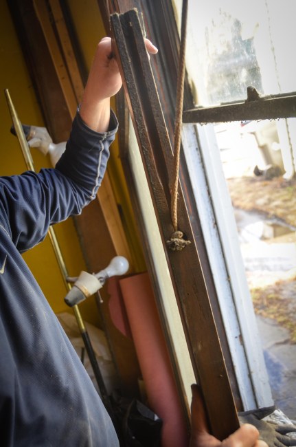 Removing the lower sash and sash cord