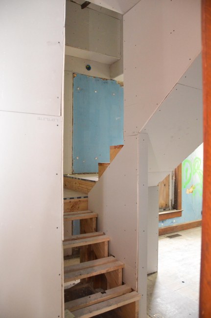 The view of the stairs from the dining room doorway