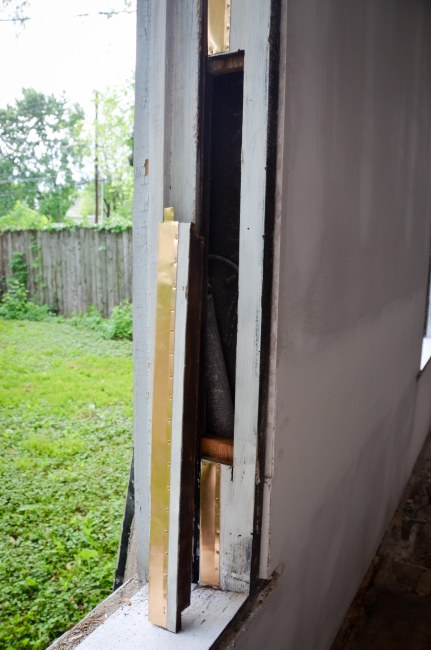 The cover removed to access the weights