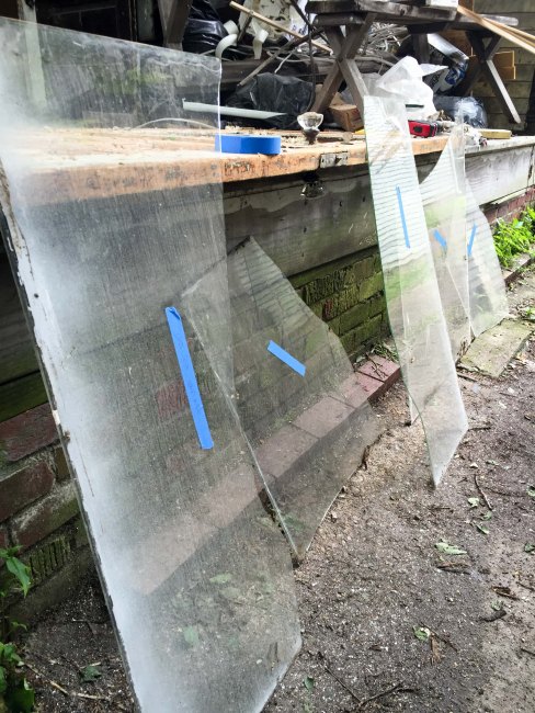 labeling the old glass to be used for the storm doors